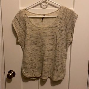 Grey short sleeved sweater.